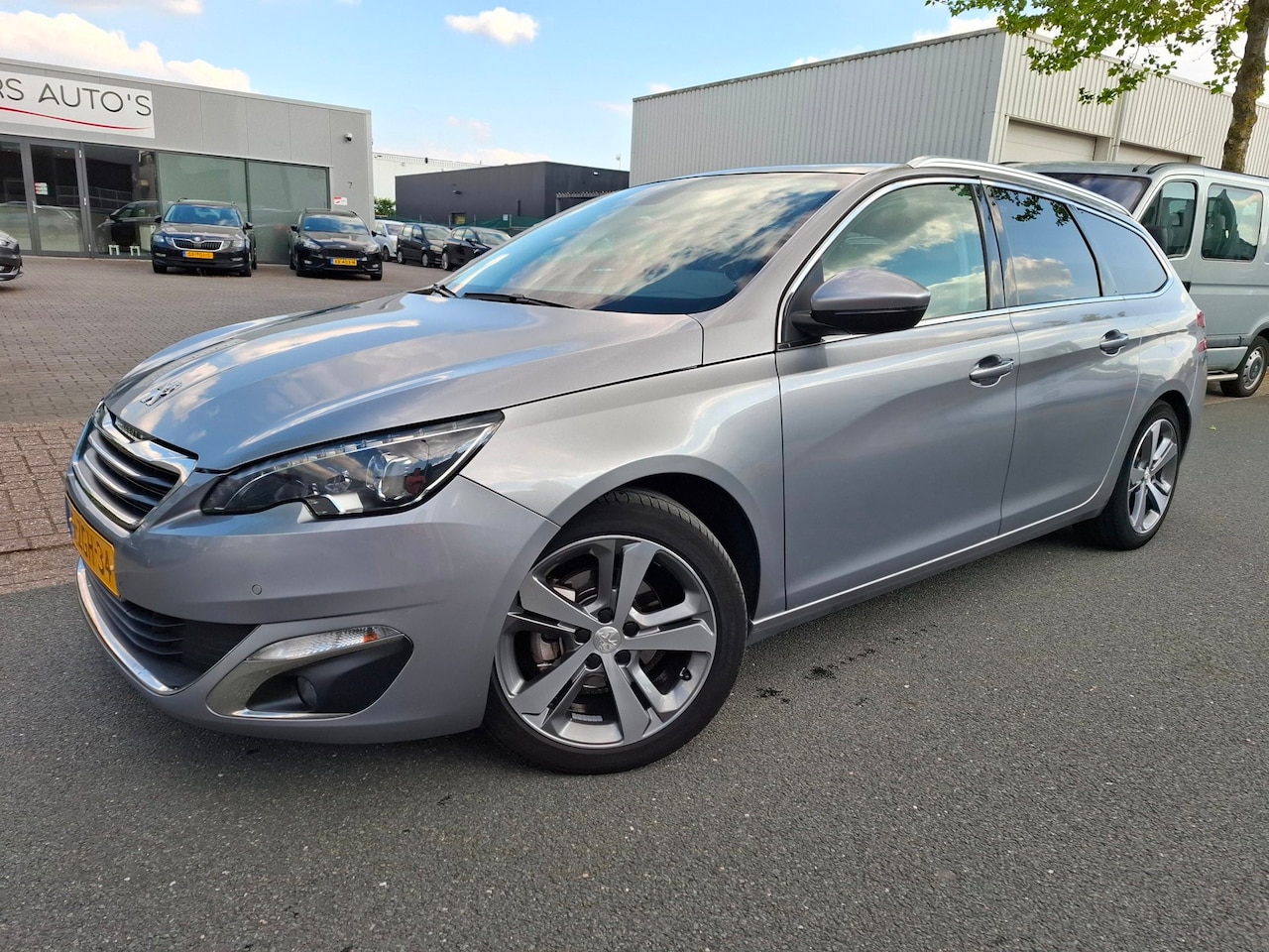 Peugeot 308 SW - 1.2 e-THP Première PANO/CLIMA/CRUISE/NAVI! - AutoWereld.nl