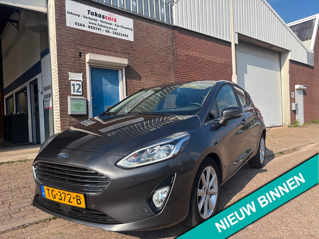 Ford Fiesta - 1.5 TDCi Titanium NAVI&AIRCO&NAP - AutoWereld.nl