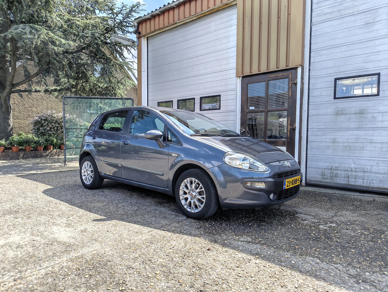 Fiat Punto Evo - 1.4 Dynamic Luxe uitvoering Lage KM NAP +Nieuwe Apk - AutoWereld.nl