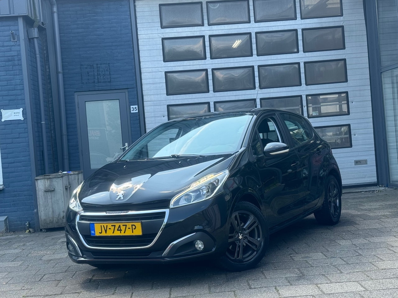 Peugeot 208 - 1.2 PureTech Blue Lion | Airco | Cruise | PDC | LMV | 5-DRS - AutoWereld.nl