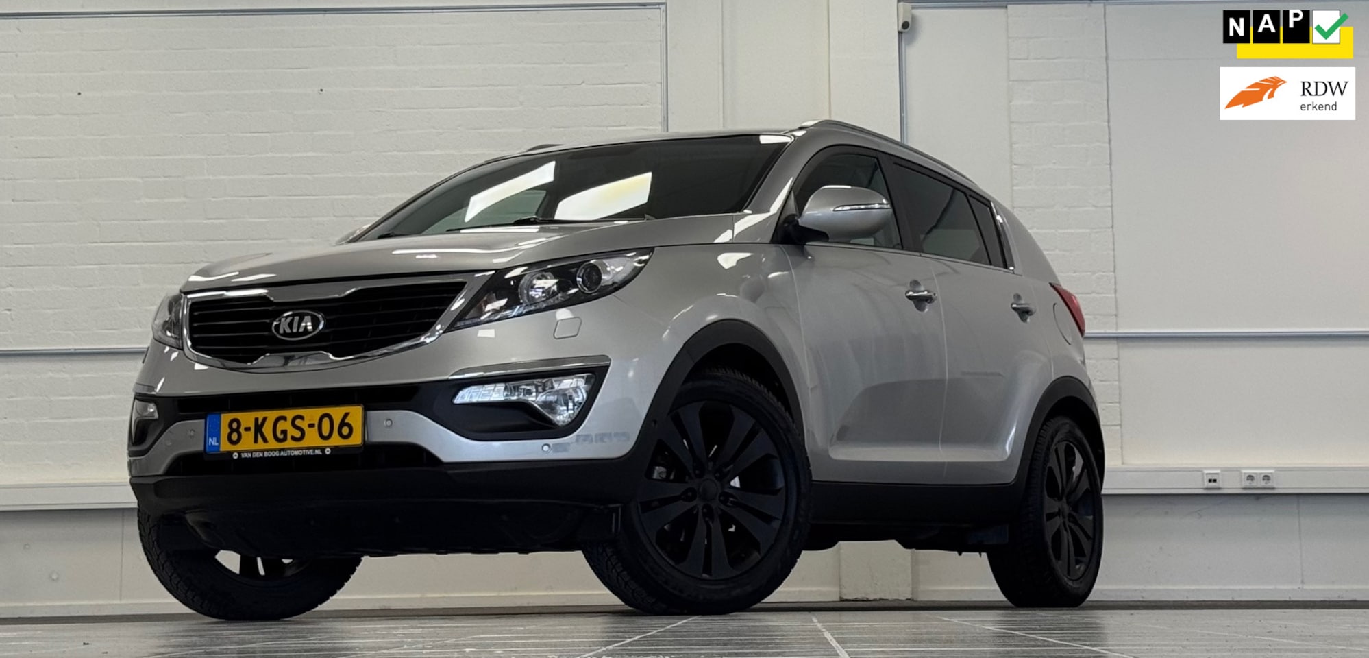 Kia Sportage - 2.0i Super Pack Lerenbekleding Trekhaak Navigatie Mooi! - AutoWereld.nl