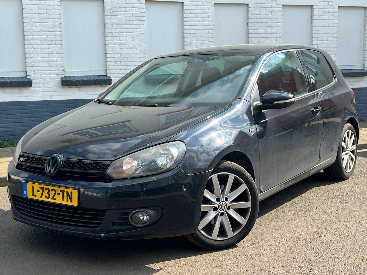 Volkswagen Golf - 1.4 TSI Highline R-Line 90kW Zwart - AutoWereld.nl
