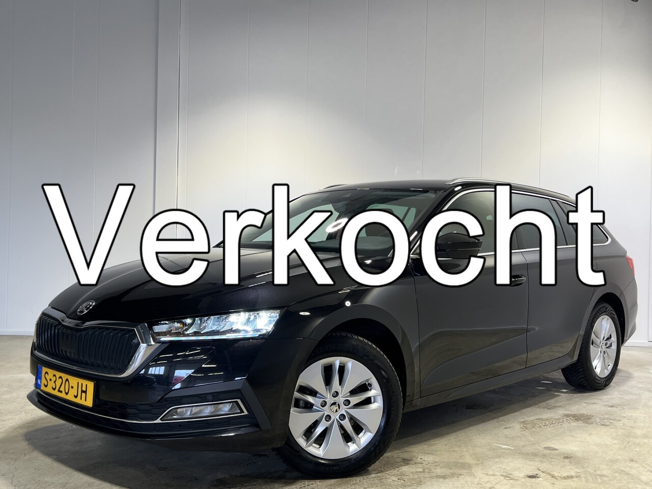 Skoda Octavia Combi - 1.0 TSI Ambition | Navigatie/Android/Apple Carplay | LM Velgen 16" | Voorstoelen Verwarmd - AutoWereld.nl