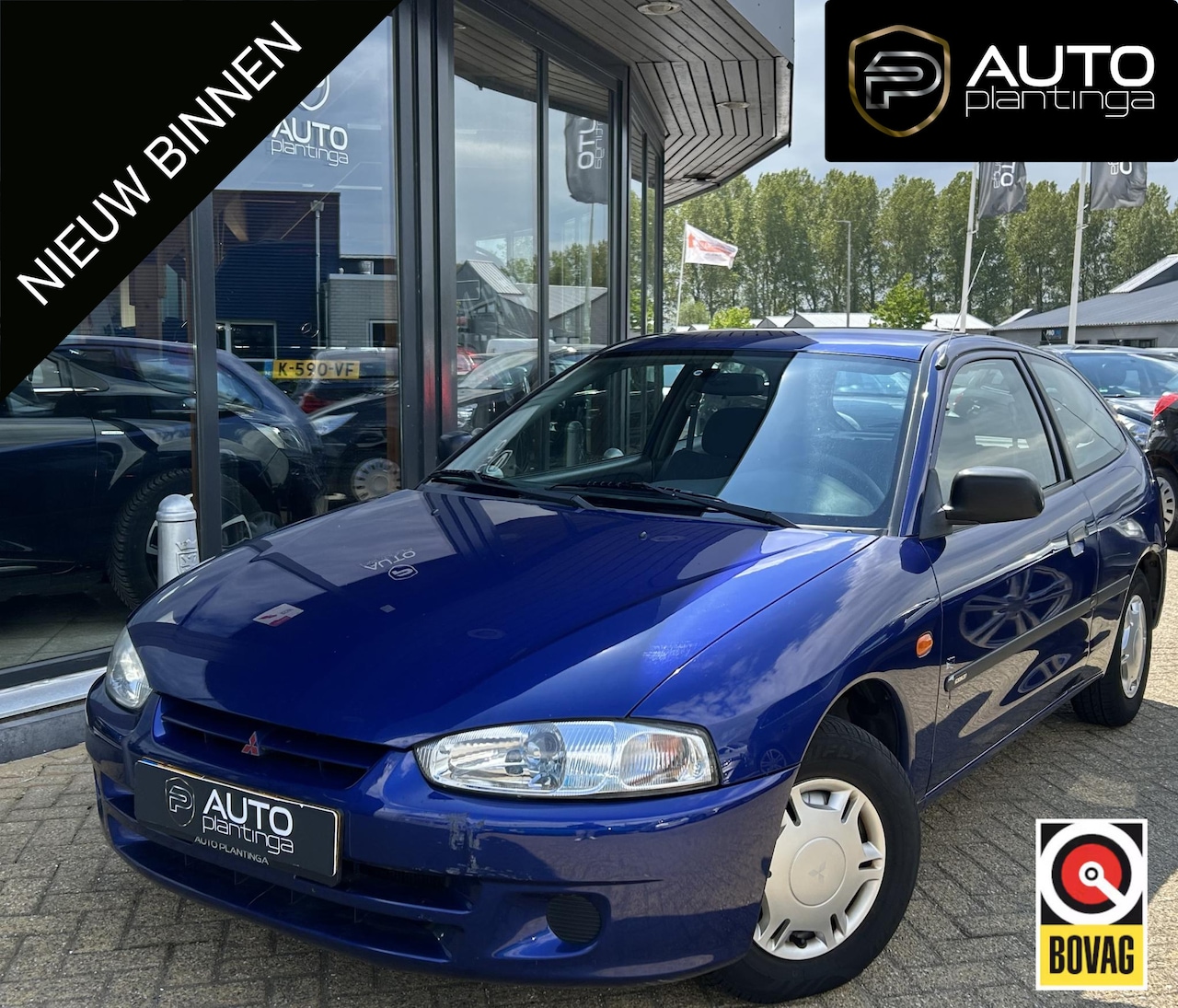 Mitsubishi Colt - 1.3 GLi 75PK | Uniek | Lage KM stand! | LIEFHEBBER AUTO | Onderhoudshistorie | NL AUTO | 2 - AutoWereld.nl