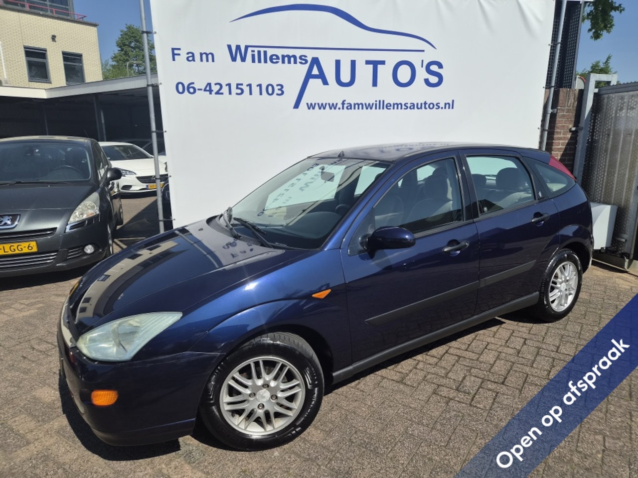 Ford Focus - 2.0-16V Ghia 2.0-16V Ghia - AutoWereld.nl