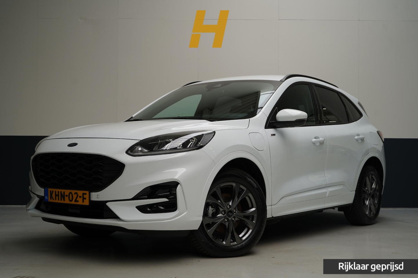 Ford Kuga - 2.5 PHEV ST-Line | Soh 99% | Camera | Carplay | Navigatie | Stoelverwarming | All-seasonba - AutoWereld.nl