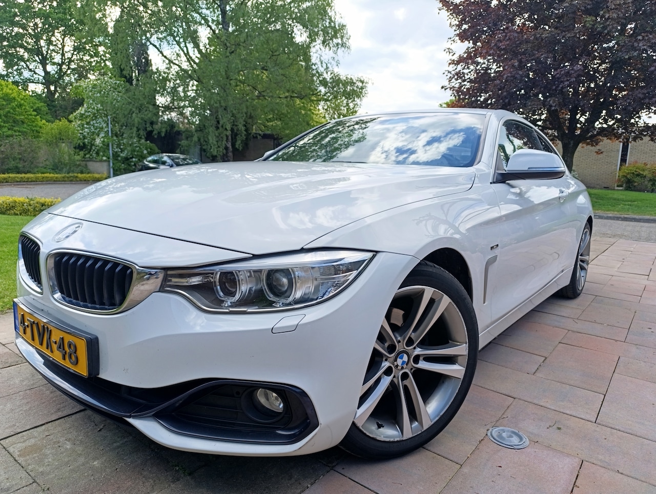 BMW 4-serie Coupé - 420i High Executive - AutoWereld.nl
