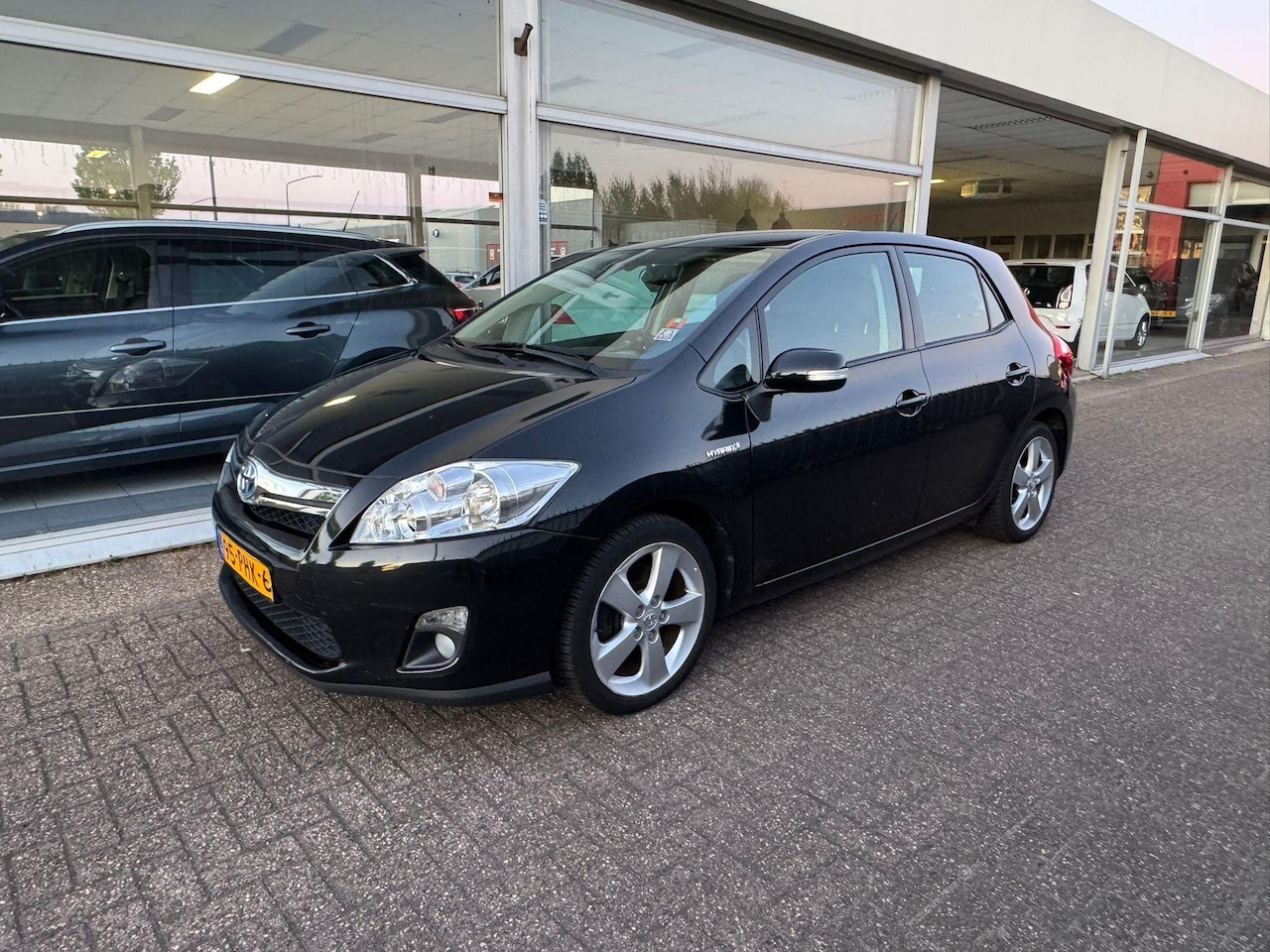 Toyota Auris - 1.8 Full Hybrid Executive | 2e eigenaar | Hybride | Automaat | Airco | Elektrische ramen | - AutoWereld.nl