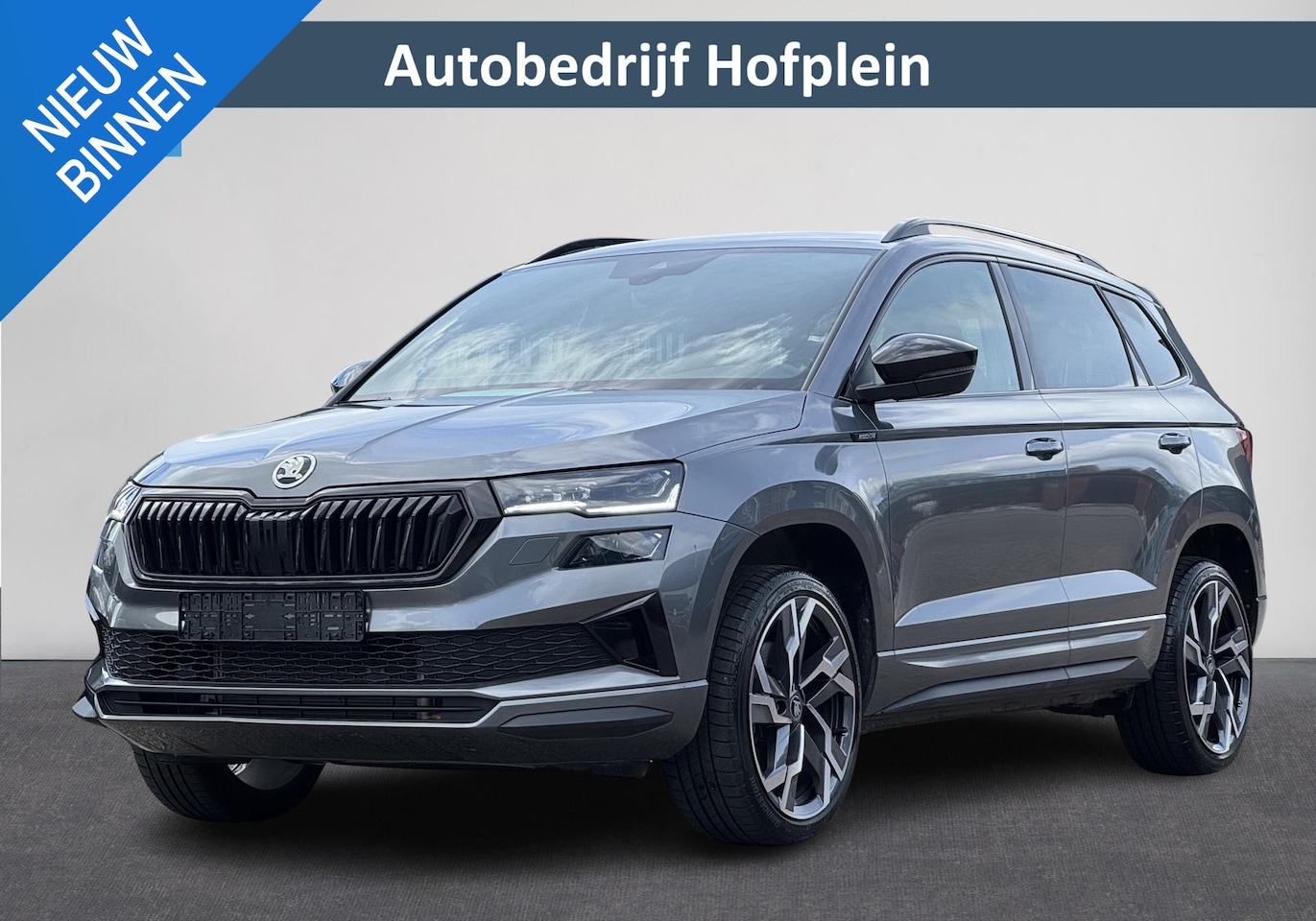 Skoda Karoq - 1.5 TSI Sportline | Automaat | Clima | Stuur/Stoelverwarming | Cruise | Carplay | Navi | P - AutoWereld.nl
