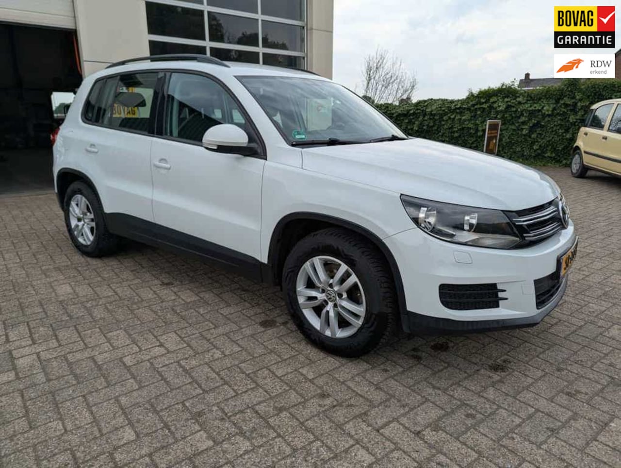 Volkswagen Tiguan - 1.4 TSI Comfort&Design Edition, 95.000 km, trekhaak 1.600 kg - AutoWereld.nl