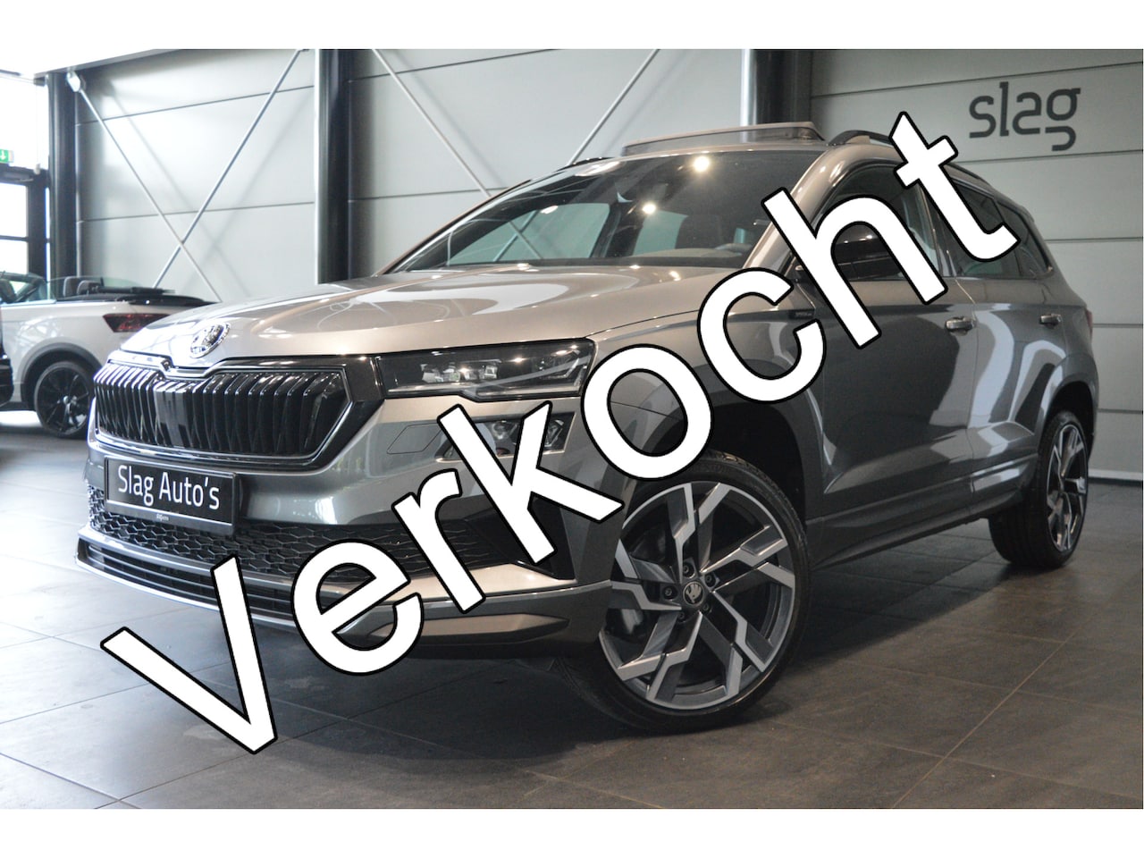 Skoda Karoq - 1.5 TSI ACT Sportline navi pano clima cruise 19 inch 150 pk !! - AutoWereld.nl