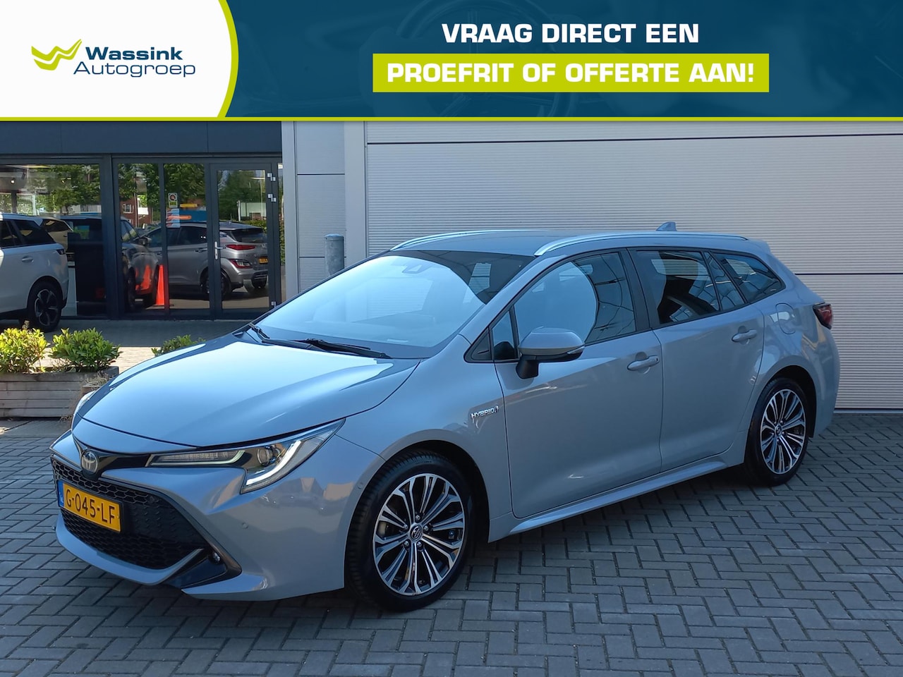 Toyota Corolla Touring Sports - 1.8 Hybrid 122pk Business Intro | Climate control | Navigatie | Lm velgen | Camera | Verwa - AutoWereld.nl