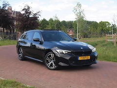 BMW 3-serie Touring - 320e M-Pakket | Panoramadak | Sfeerverlichting | Facelift |