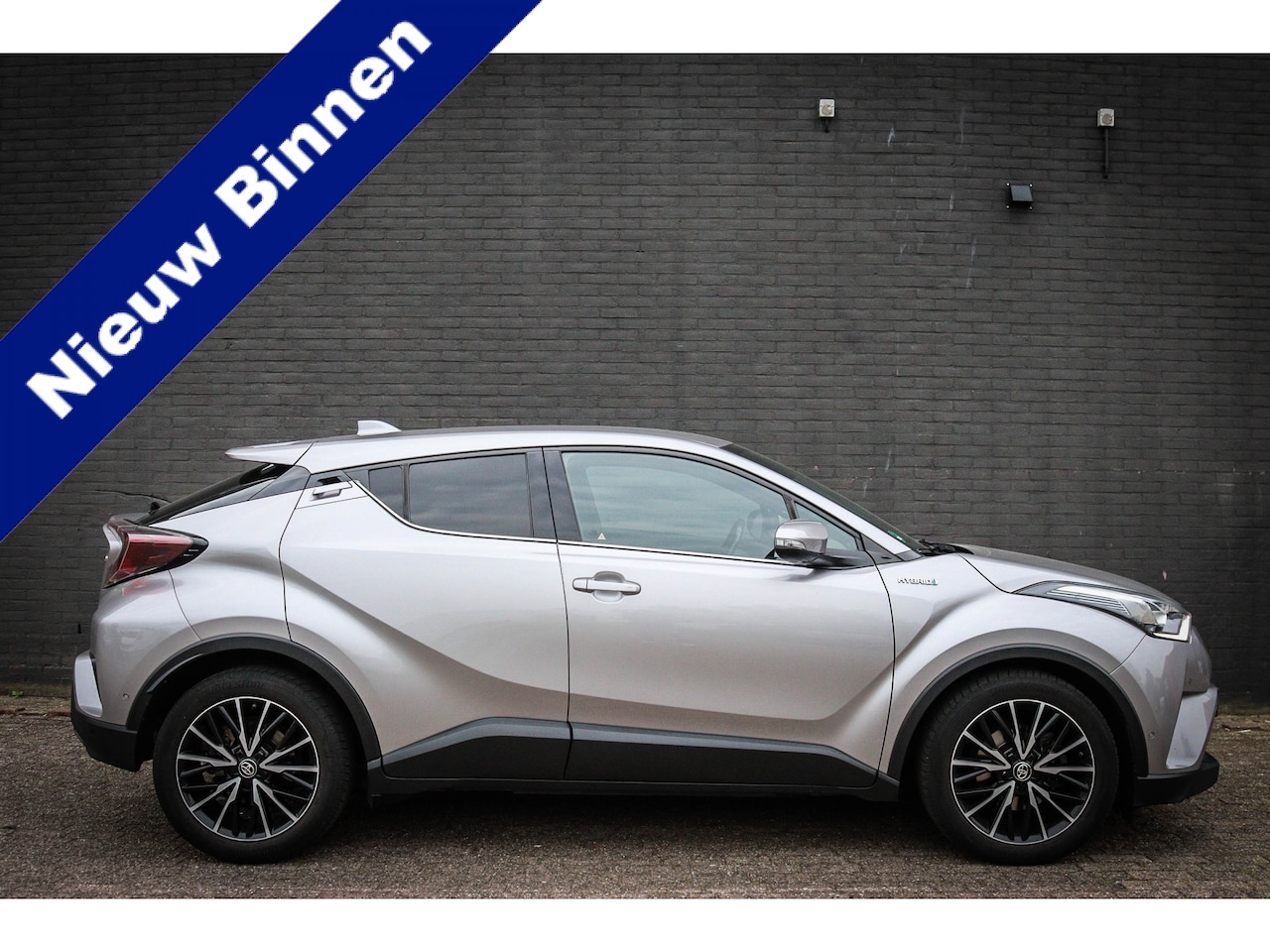 Toyota C-HR - 1.8 Hybrid Executive Net binnen - Nu al te bezichtigen - AutoWereld.nl