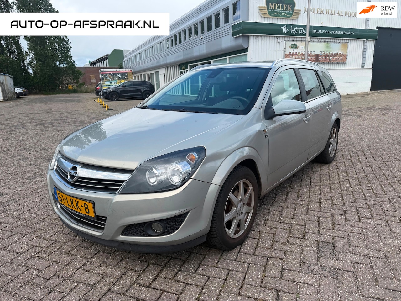 Opel Astra Wagon - 1.6 Cosmo Navi Clima Cruise Trekhaak Airco - AutoWereld.nl