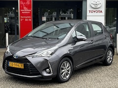 Toyota Yaris - 1.5 Hybrid DESIGN NAVI CRUISE CLIMA CAMERA BLUETOOTH 15'' LM-VELGEN NL-AUTO
