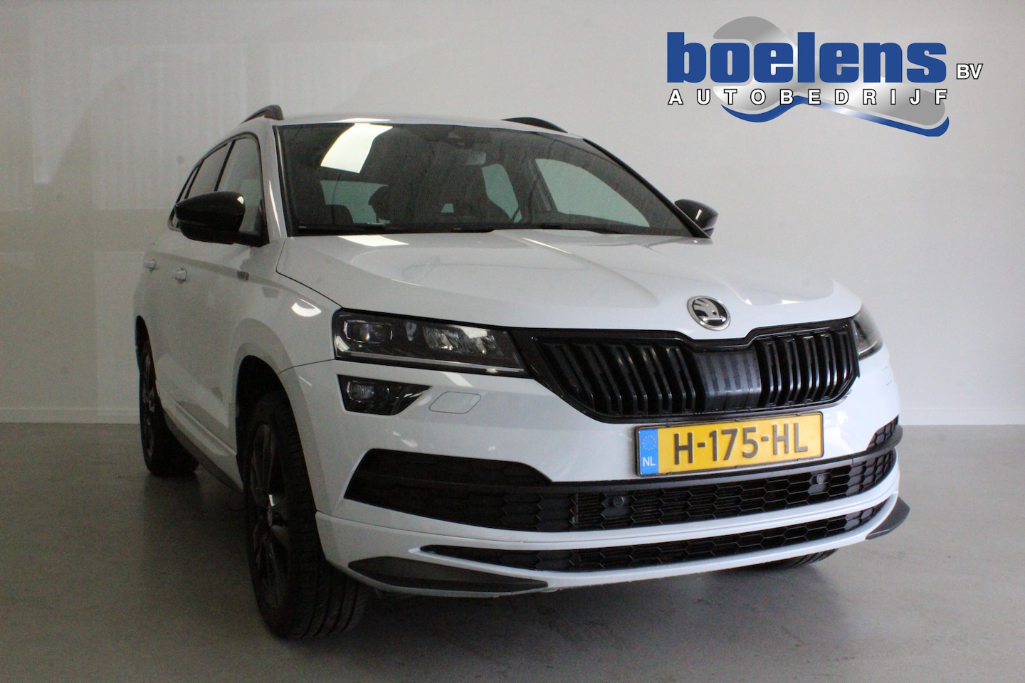 Skoda Karoq - 1.5 TSI ACT Sportline Business | CANTON | TREKHAAK | ACC | BLINDSPOT | CAMERA | STOEL-VERW - AutoWereld.nl