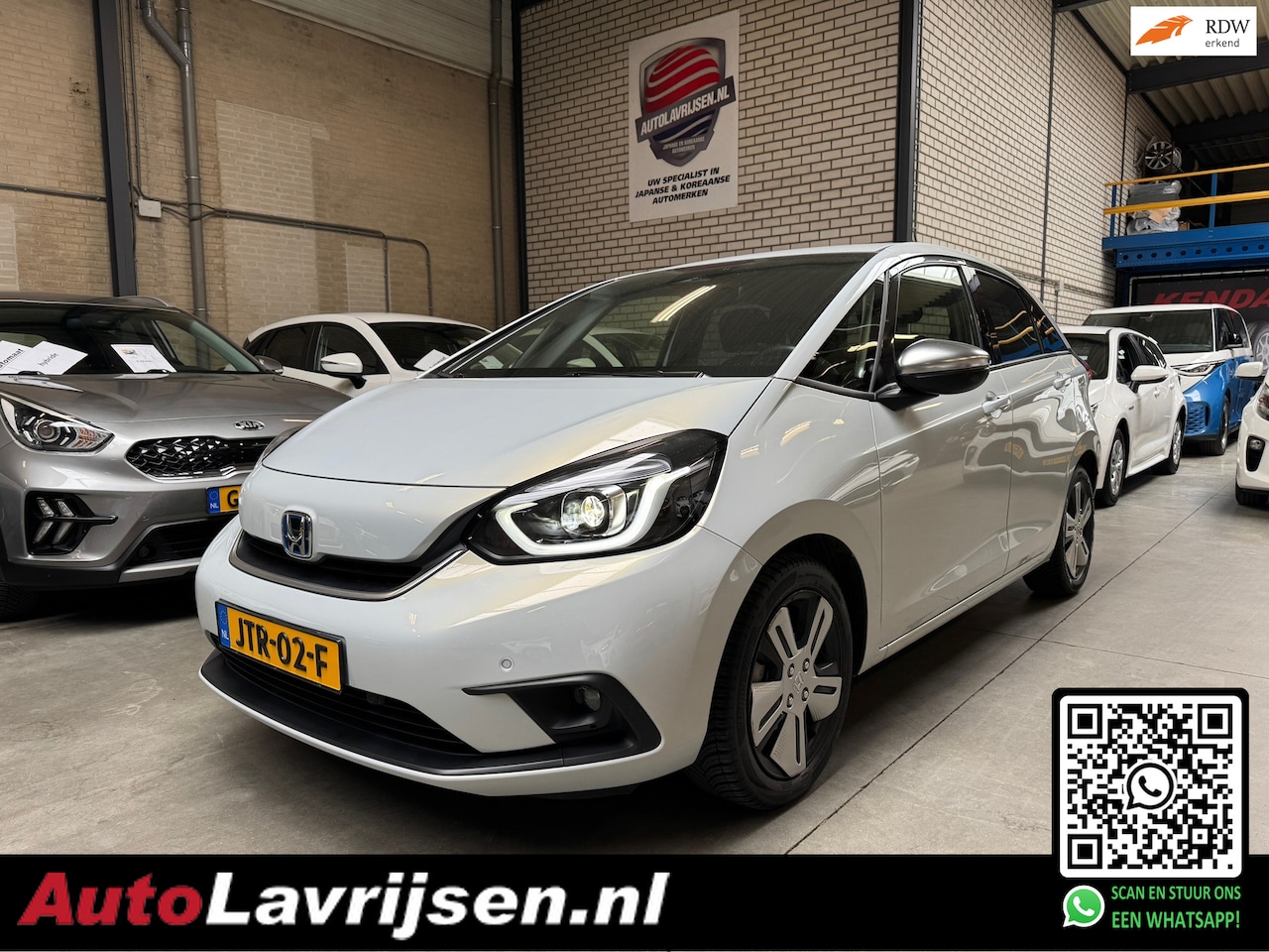 Honda Jazz - 1.5 e:HEV EXECUTIVE AUTOMAAT HYBRIDE 33DKM NAVIGATIE/CAMERA EN ALLE OPTIES!! - AutoWereld.nl