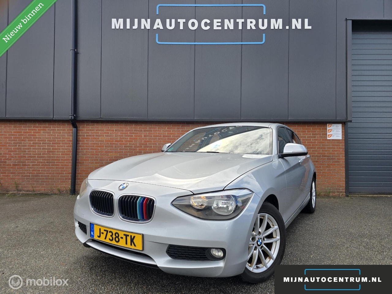 BMW 1-serie - 116i High Executive / CLIMA / APK / NAVI - AutoWereld.nl