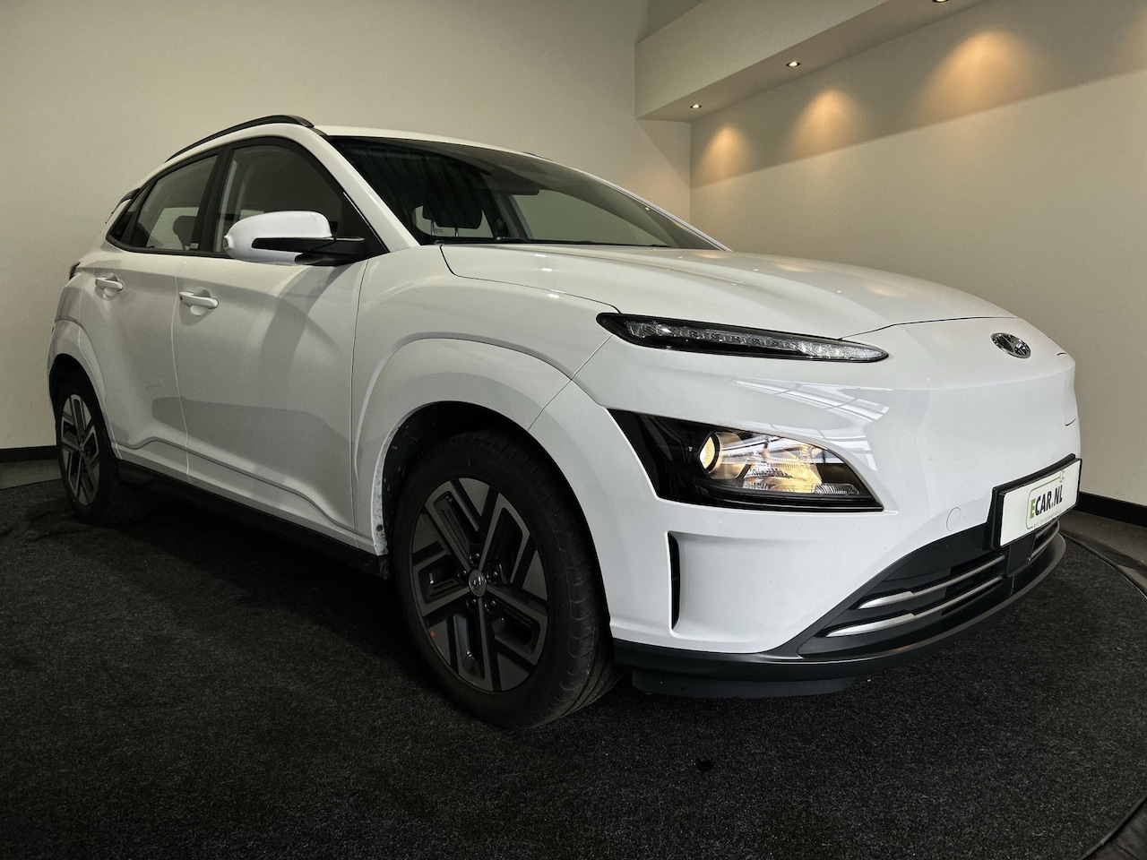 Hyundai Kona Electric - EV Comfort 39 kWh - Verwarmde stoelen | Digitaal dashboard | Hill hold functie | - AutoWereld.nl