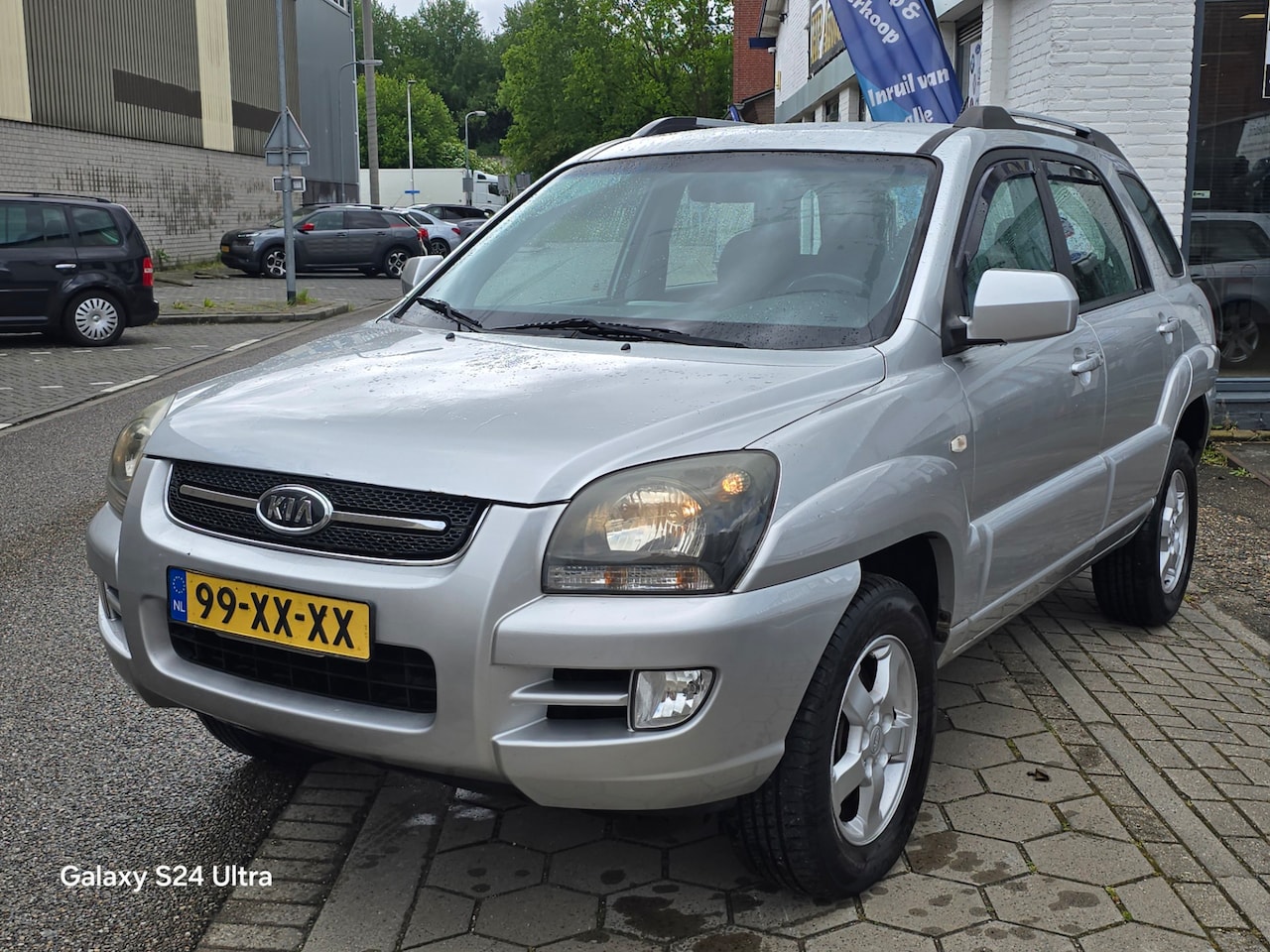 Kia Sportage - 2.0 CVVT X-ecutive*2e eig*nap*apk*airco*trekhaak*achteruit camra*rijd petfect*inruil mog!! - AutoWereld.nl