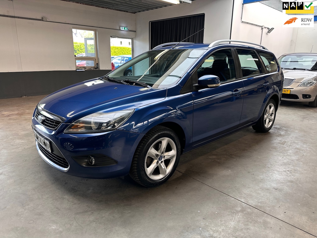 Ford Focus Wagon - 1.8 Limited Flexi Fuel|Airco|NAVI|Cruise - AutoWereld.nl