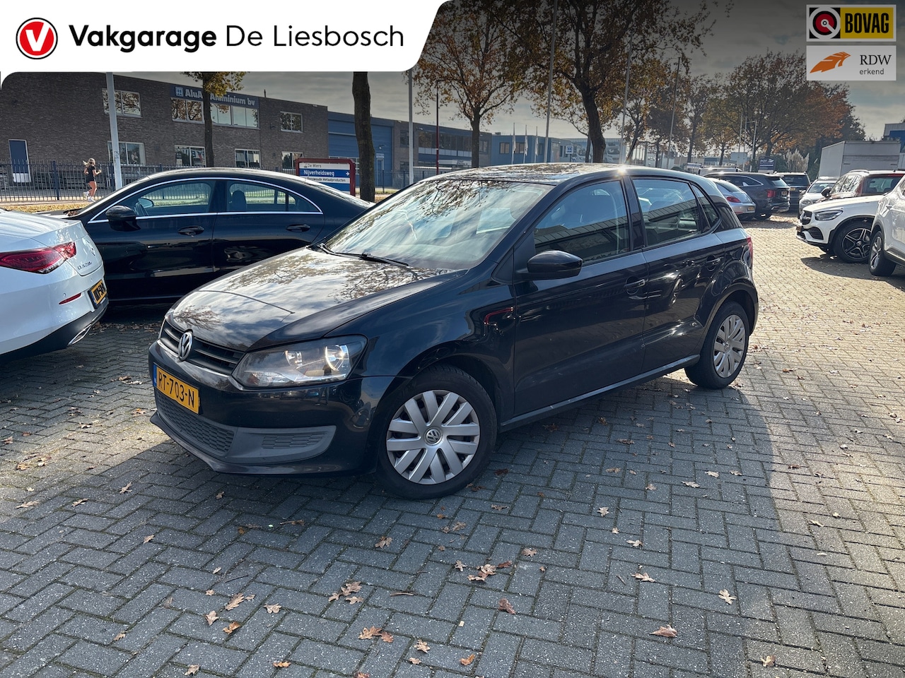 Volkswagen Polo - 1.2-12V Comfortline/airco/navi/pdc/boeken/5 deurs - AutoWereld.nl