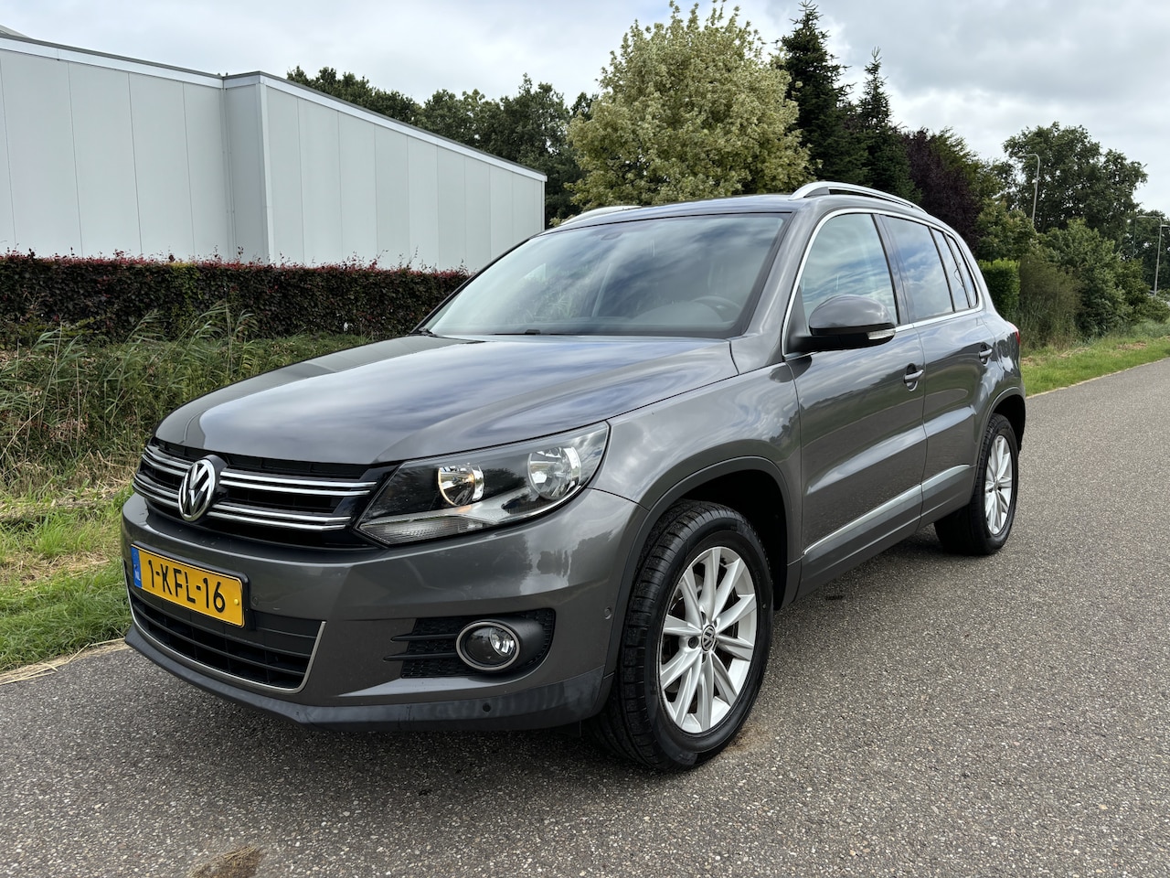 Volkswagen Tiguan - 1.4 TSI Sport&Style / AIRCO / NAVI / EXPORT - AutoWereld.nl