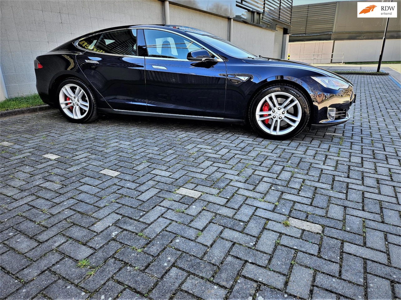 Tesla Model S - 85D Performance*€ 20.500 NETTO*700PK AUTOPILOT/PANODAK/LUCHTVERING - AutoWereld.nl