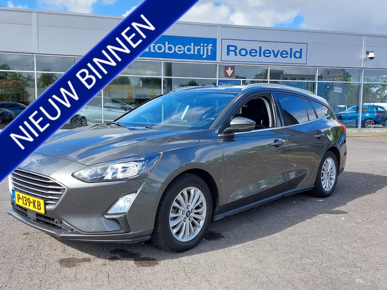 Ford Focus Wagon - 1.0 EcoBoost 155pk Hybrid Titanium Business | Navi | Apple Carplay | Clima | Cruise | Keyl - AutoWereld.nl