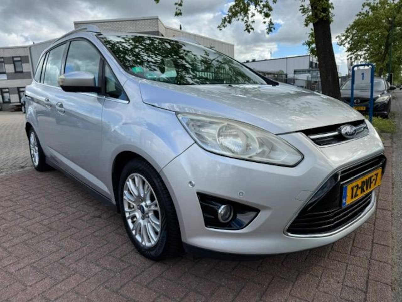 Ford Grand C-Max - 1.6 Titanium 7persoons Airco/ECC,Navigatie,Cruisecontrol - AutoWereld.nl