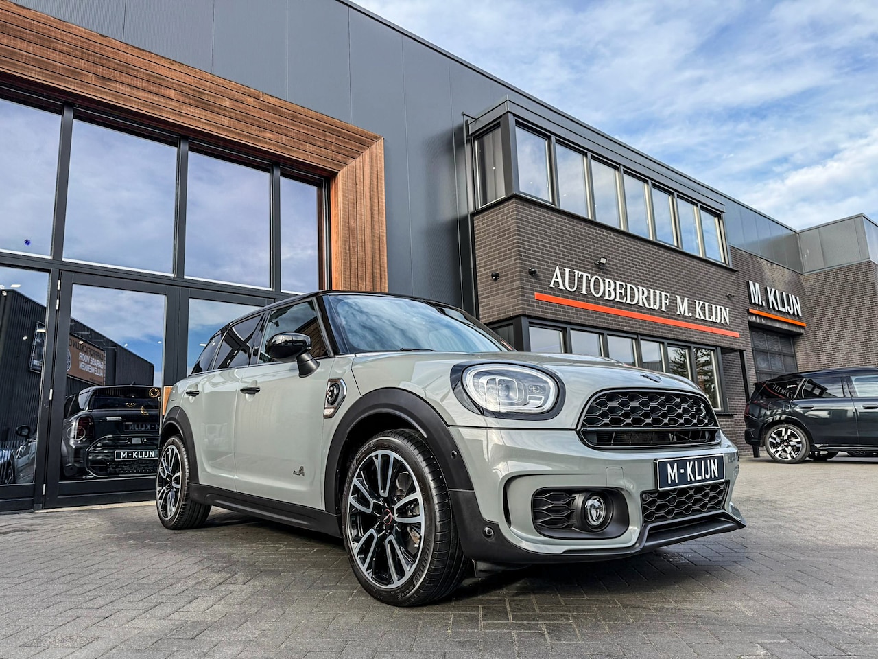 MINI Countryman - Mini 2.0 Cooper S E ALL4 John Cooper Works 220pk/Nardo/Lounge leer/Camera/19" Jcw/Vol - AutoWereld.nl