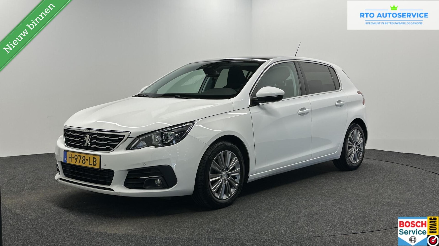 Peugeot 308 - 1.2 PureTech Blue Lease Premium CAMERA CARPLAY NAVI ECC CRUISE LM. - AutoWereld.nl