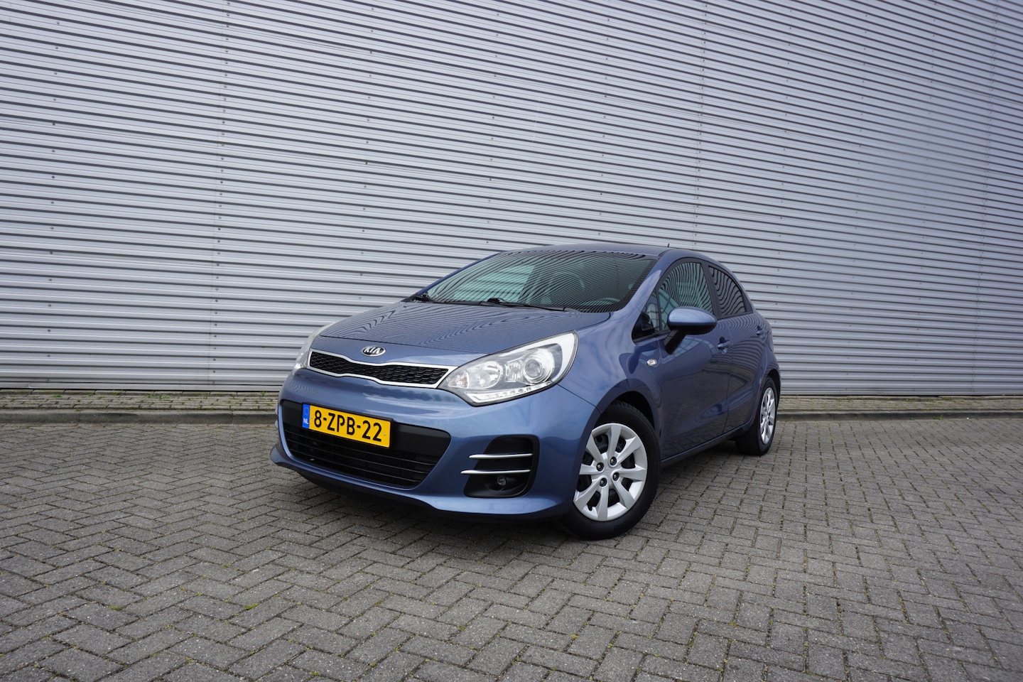 Kia Rio - 1.2 CVVT DynamicLine 1e Eigenaar - Airco / Cruise / Elektr. ramen / Trekhaak / Lm velgen / - AutoWereld.nl