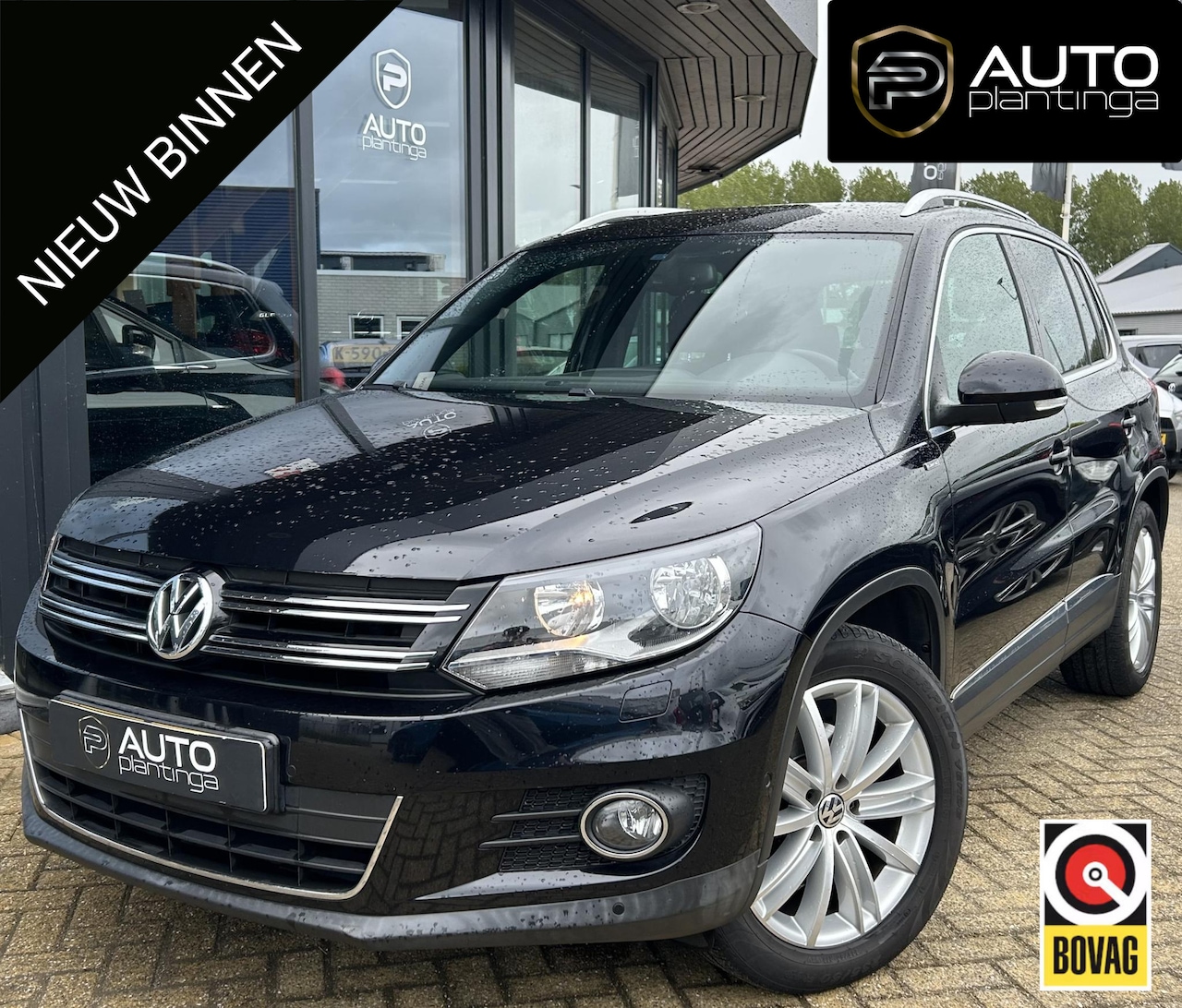 Volkswagen Tiguan - 1.4 TSI LIFE 122PK | PANO | Trekhaak | Stoelverwarming | Climate Control | Parkeersensoren - AutoWereld.nl