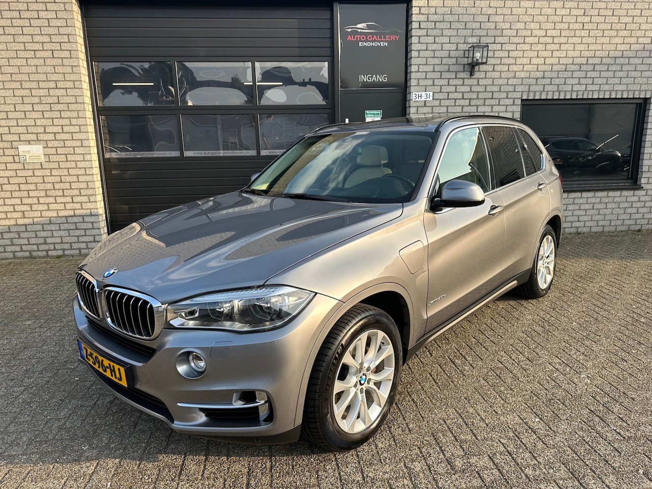 BMW X5 - xDrive40e iPerformance High Executive *PANO-DAK*TREKHAAK*HEAD-UP*LEDER*NAVI* - AutoWereld.nl