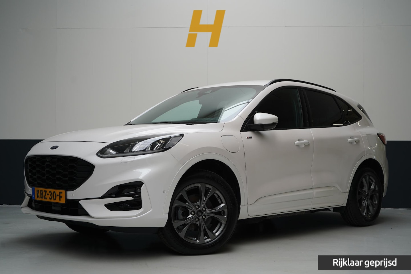 Ford Kuga - 2.5 PHEV ST-Line | Blind spot | Navigatie | Adaptive cruise | Camera | Apple Carplay | Key - AutoWereld.nl