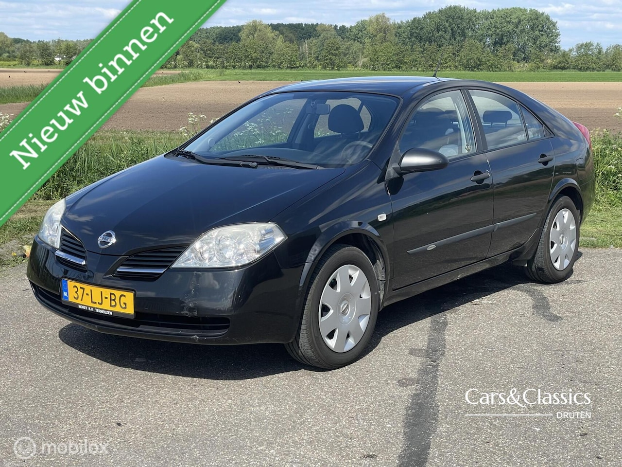 Nissan Primera - 1.6 - 97.000 km - Top onderhoud - Volle tank! - AutoWereld.nl