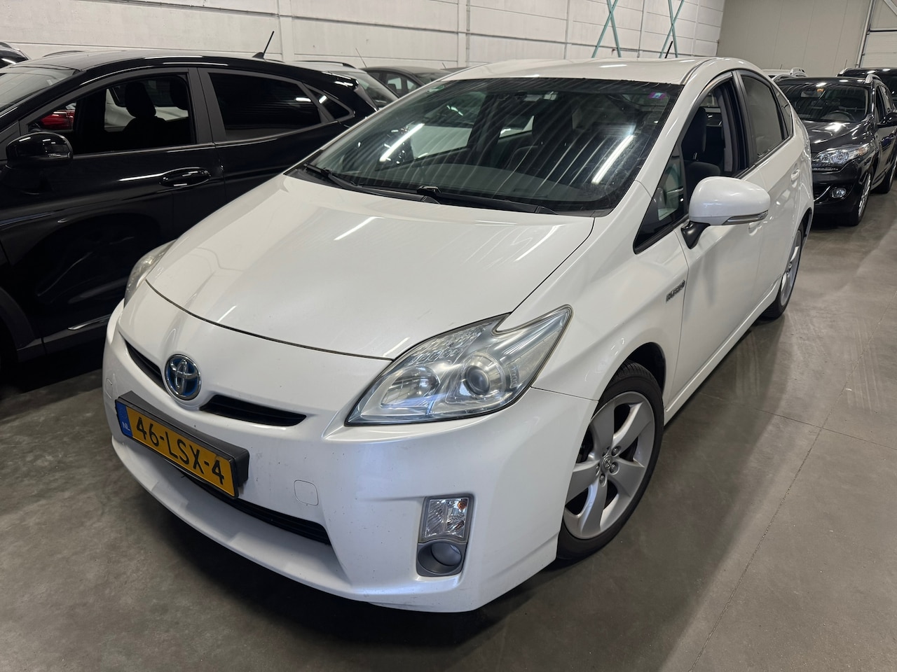 Toyota Prius - 1.8 Aspiration HEADUP TREKHAAK TOP ONDERHOUDEN - AutoWereld.nl