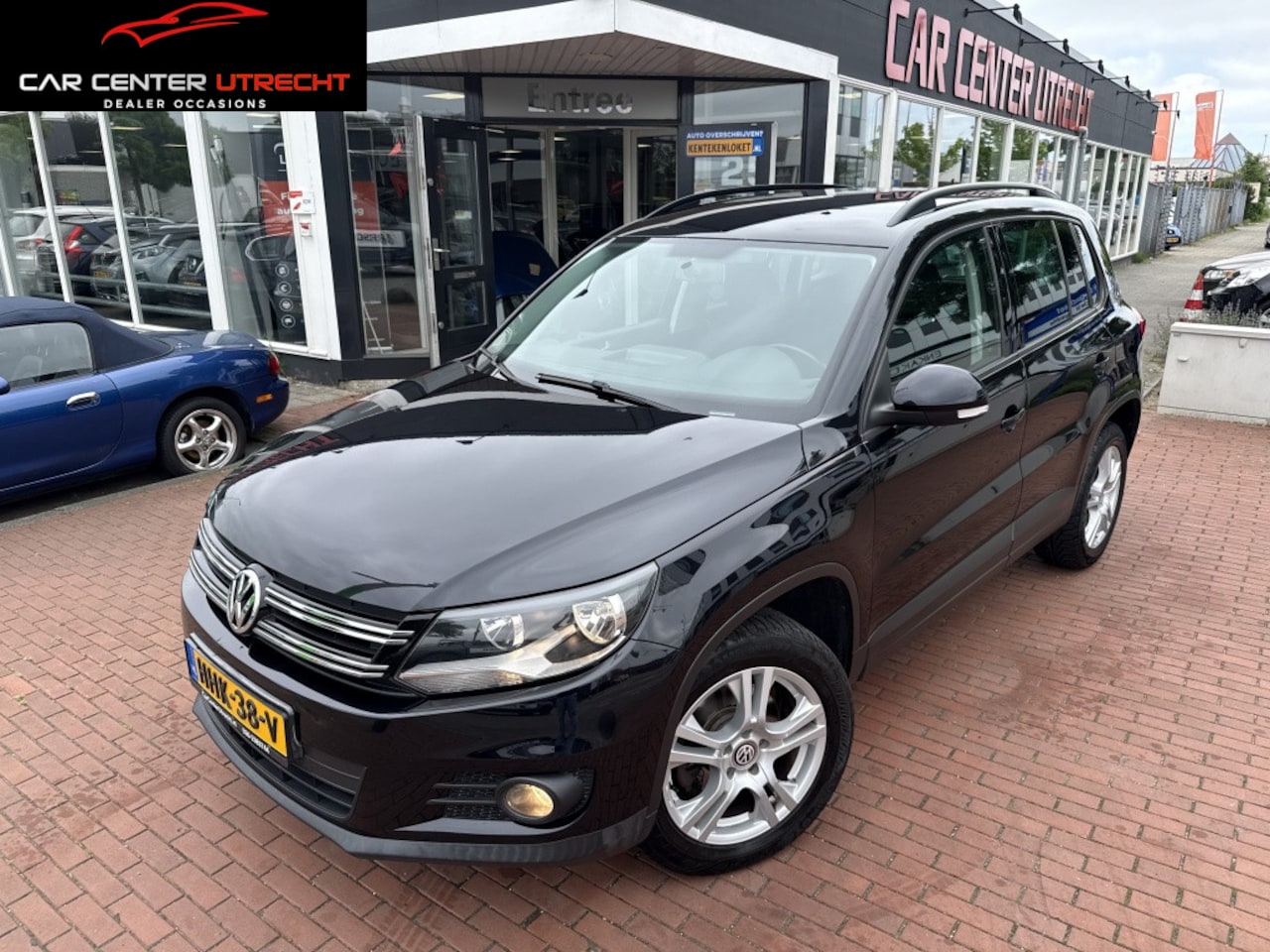 Volkswagen Tiguan - 1.4 TSI Sport&Style 6versn airco navi nette mpv - AutoWereld.nl