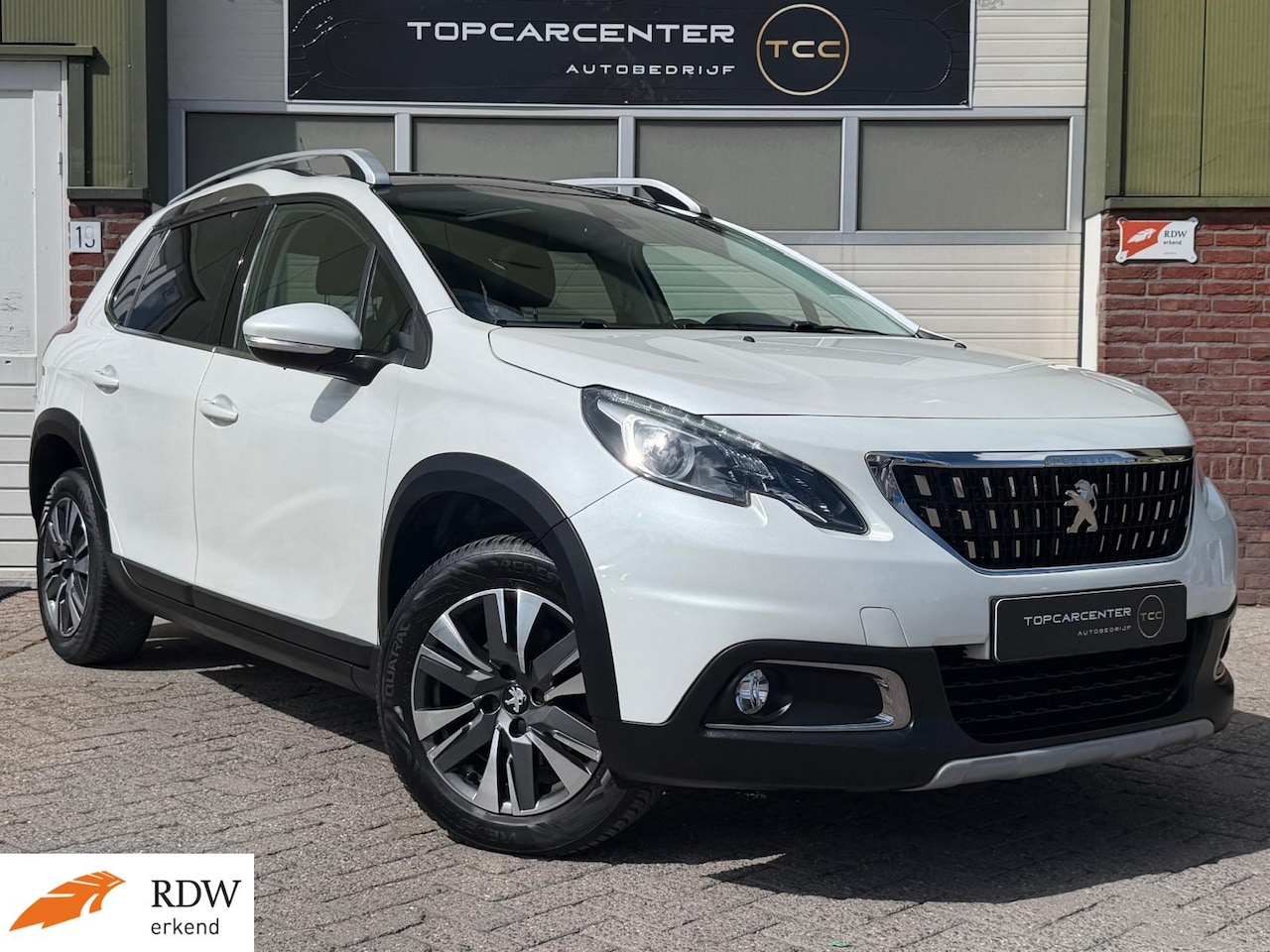 Peugeot 2008 - 1.2 Allure/AUT/CARPLAY/CAMERA/TREKH/NAVI/APK - AutoWereld.nl