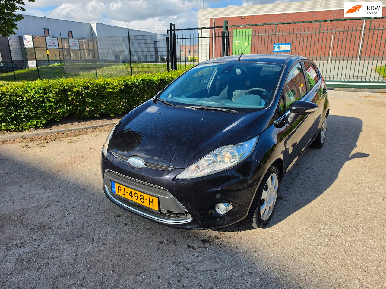 Ford Fiesta - 1.25 Titanium CLIMA PDC NIEUWE APK 12-05-2027 - AutoWereld.nl