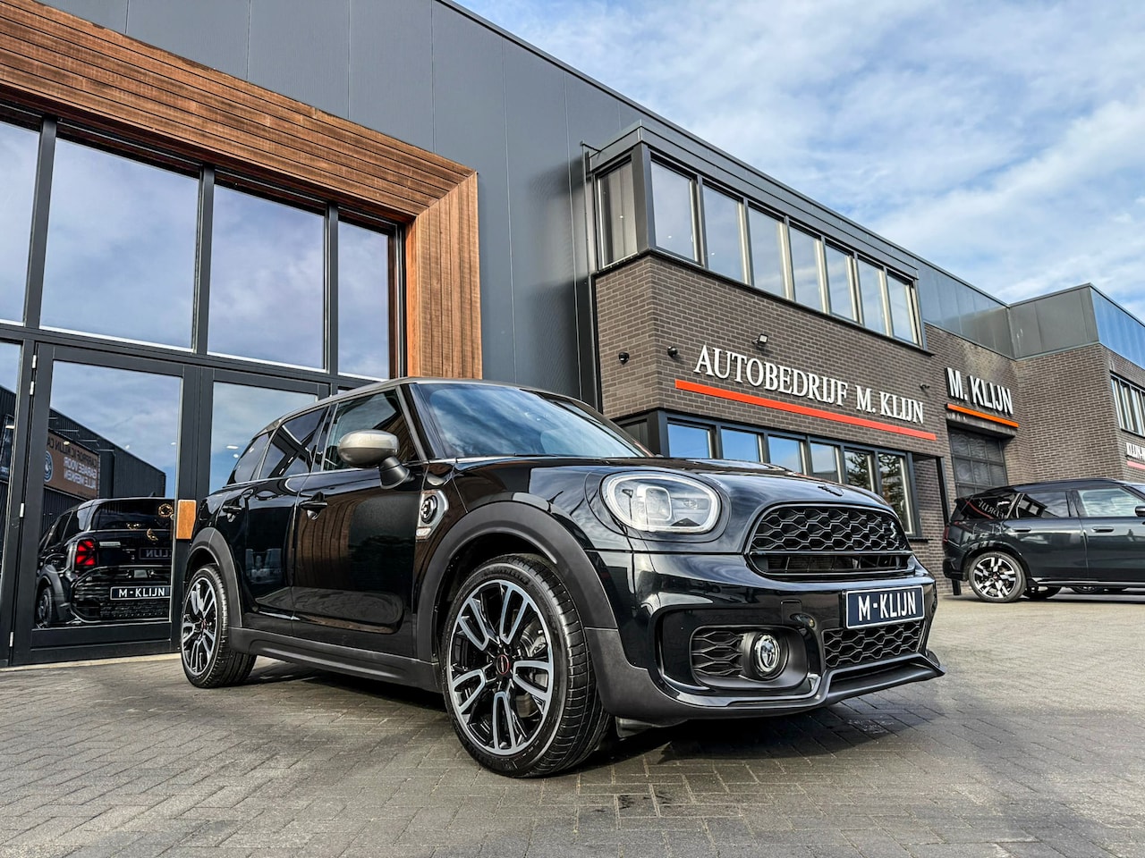 MINI Countryman - Mini Cooper S E ALL4 John Cooper Works Aut 220pk/Jcw Stoelen/Camera/Navi/19"Jcw/Btw - AutoWereld.nl