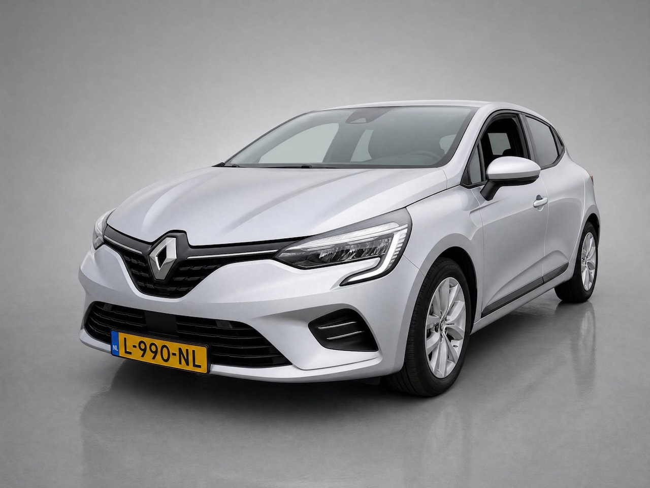 Renault Clio - 1.6 E-Tech Hybrid 140 Business Zen / Parkeersensoren / CruiseControl / Airco / Bluetooth - AutoWereld.nl