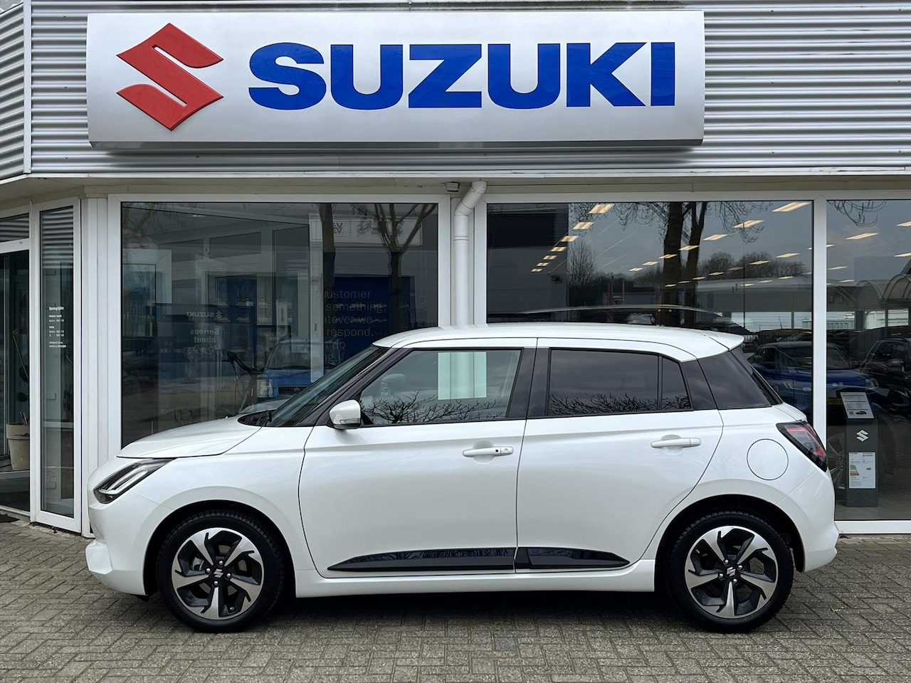 Suzuki Swift - 1.2 Smart Hybrid 83pk Automaat Style (RIJKLAARPRIJS) *Tot 10 Jaar Suzuki Garantie - AutoWereld.nl
