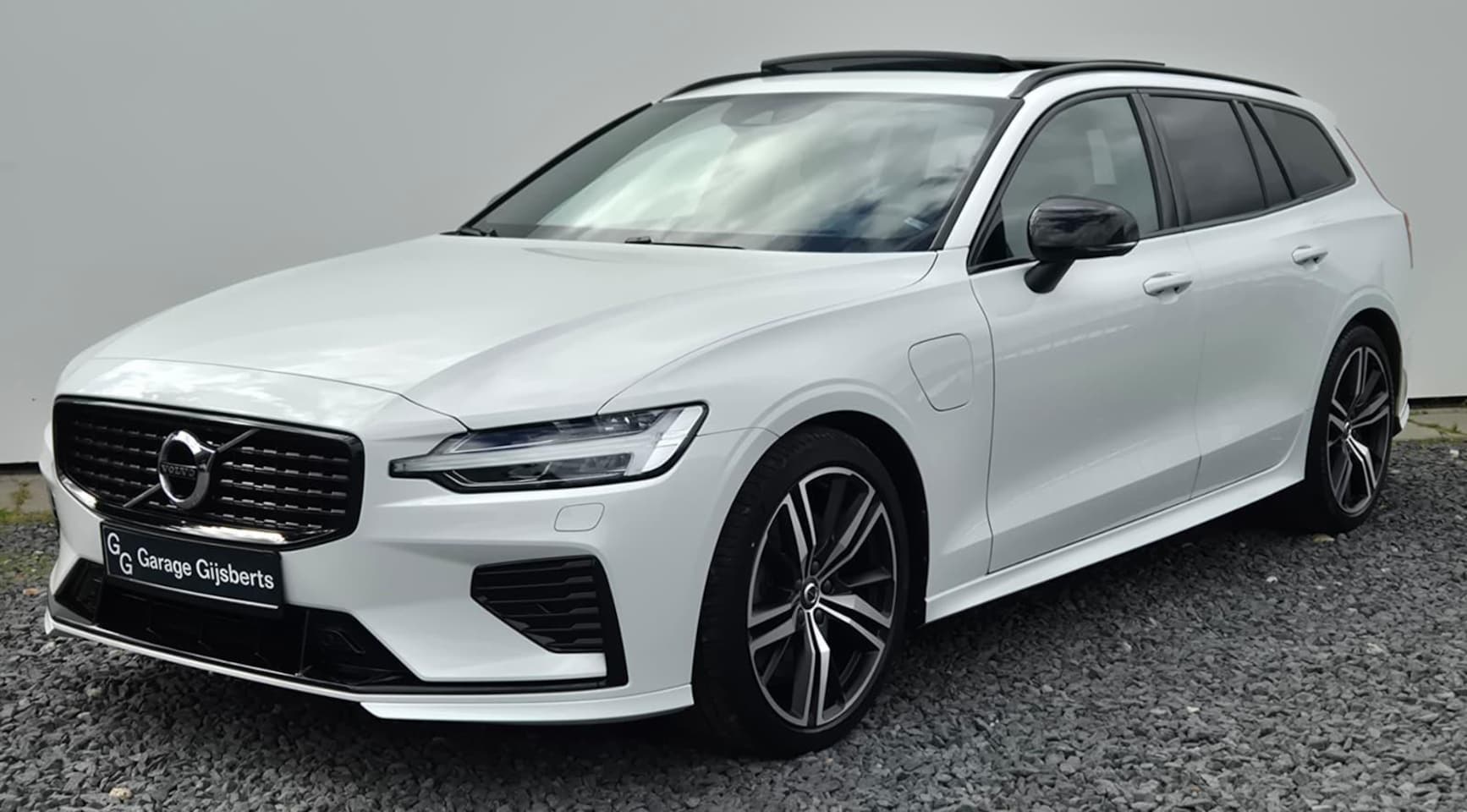Volvo V60 - 2.0 T6 Recharge AWD R-Design Head Up - Stoelventilatie voor - Luxe lederen bekleding - Pan - AutoWereld.nl