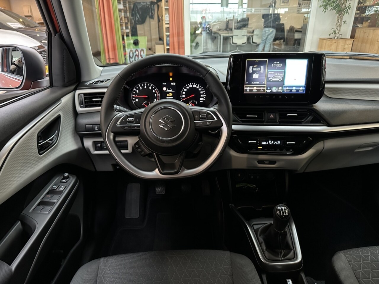 Suzuki Swift - 1.2 Style Smart Hybride [ 10JAAR GARANTIE I €1600 VOORDEEL I CA - AutoWereld.nl