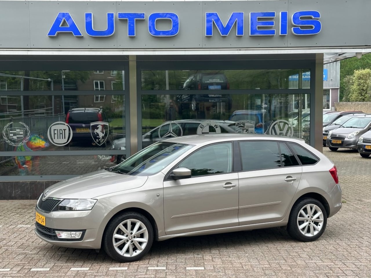 Skoda Rapid - 1.6 TDI Greentech Elegance Businessline Navi Airco Cruise Telefoon NAP-Autopas - AutoWereld.nl