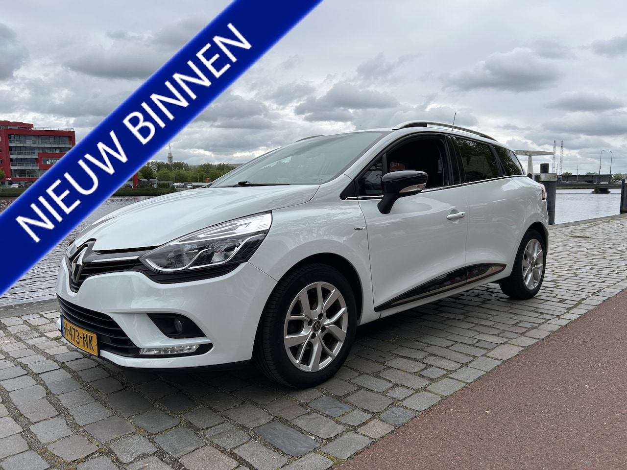 Renault Clio Estate - 0.9 TCe Limited navigatie airco/ecc keurige auto - AutoWereld.nl