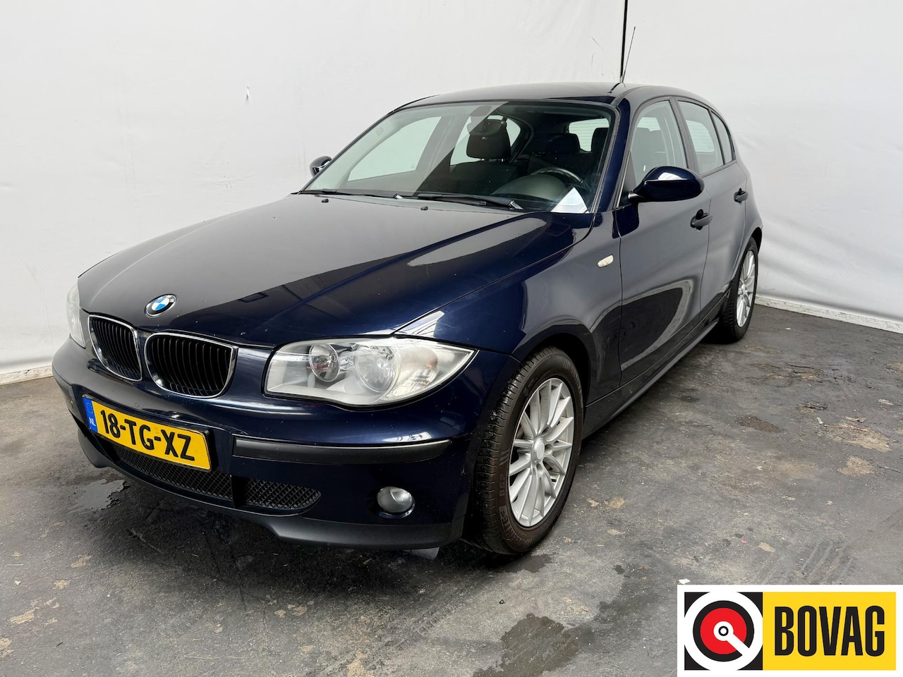 BMW 1-serie - 116i Business Line nieuwe ketting - AutoWereld.nl